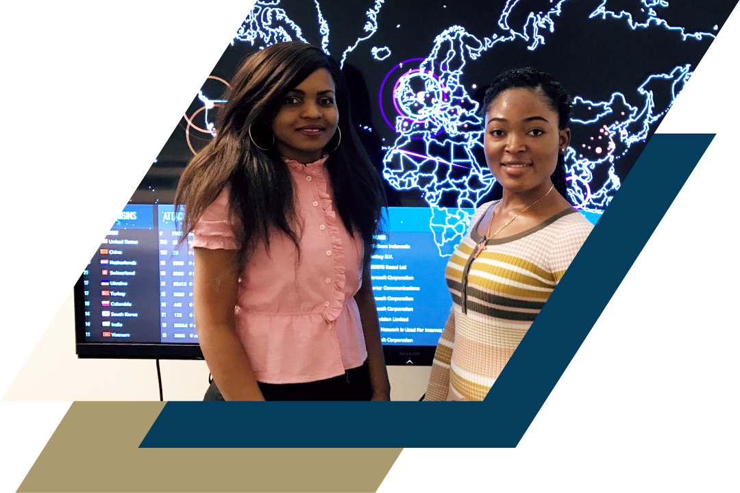Two female cyber students in cyber lab