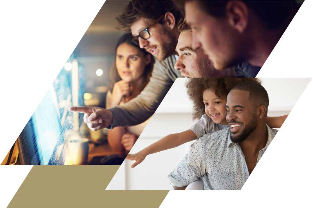 People looking intently at a computer; A dad with his daughter