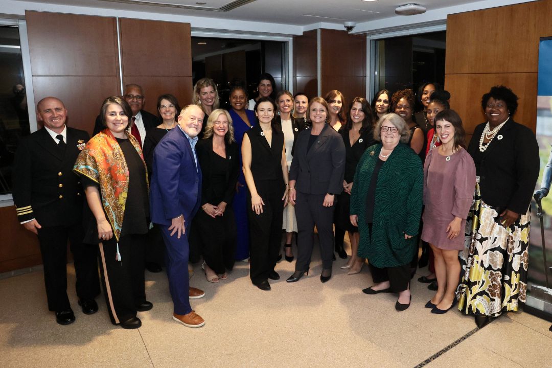 Group of ECLC cohort 4 graduates posing with Dean Riddle