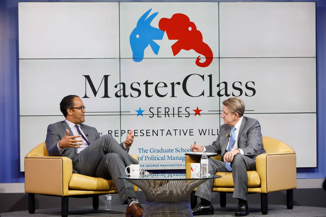 Rep. Will Hurd and Steven Billet sitting onstage in front of MasterClass series screen