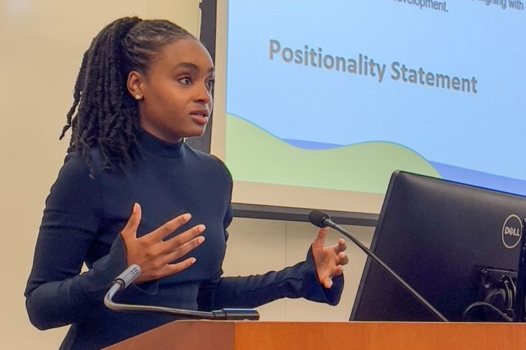 Arielle Lofton talking at a podium