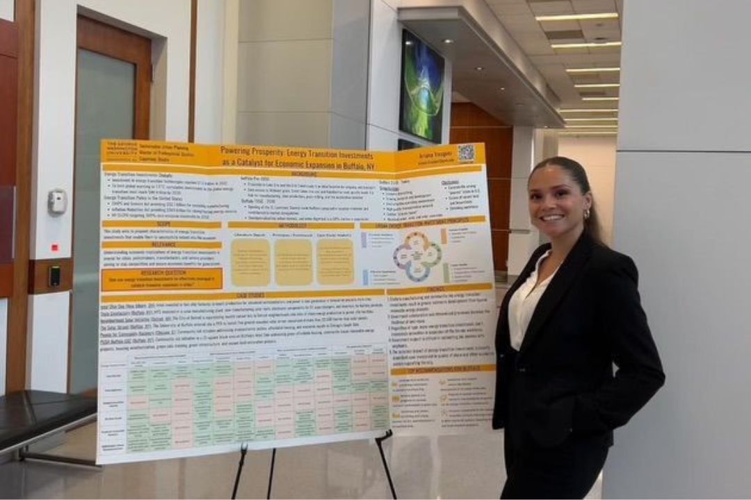 Ariana Vasquez with her Capstone poster