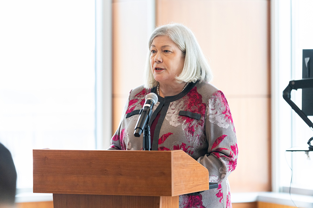 GW president at podium