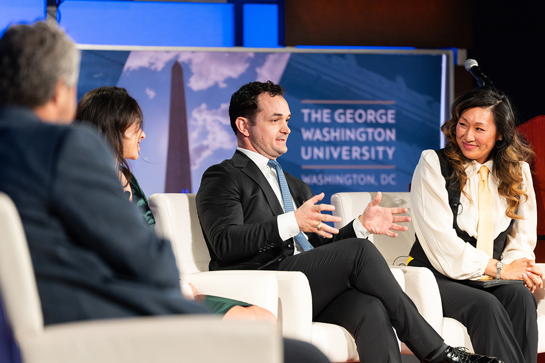 panel of speakers at cyber conference