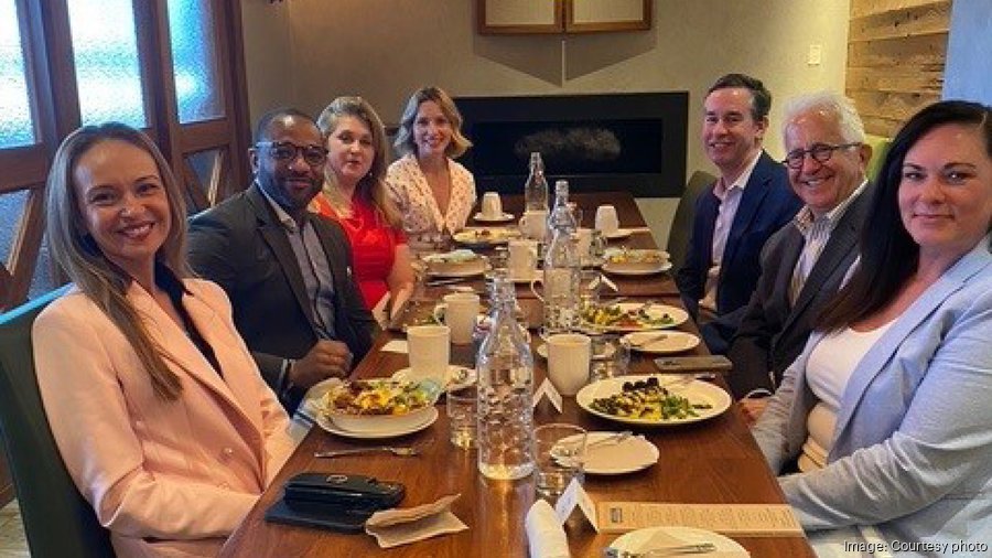 Public Relations and Communications faculty sit at dinner table