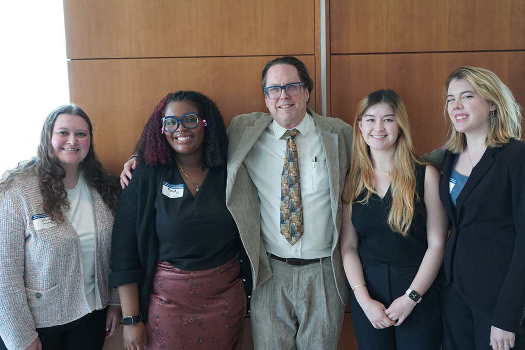 Jessica Irving, Maiya Norwood, John Warren, Breanna Crossman, and Amelia Nason standing together and smiling