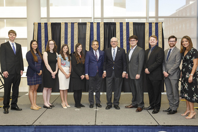 Cameron Peters pictured with other Distinguished Scholars at the dinner in April.