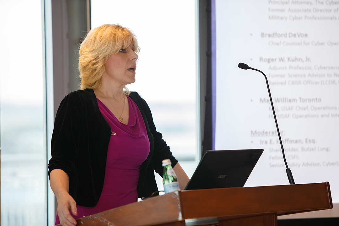 Connie Uthoff speaks at podium 