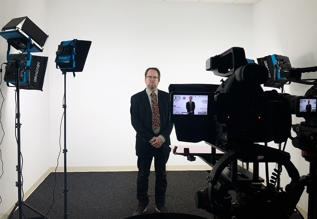 John Warren, publishing program director, filming in new studio