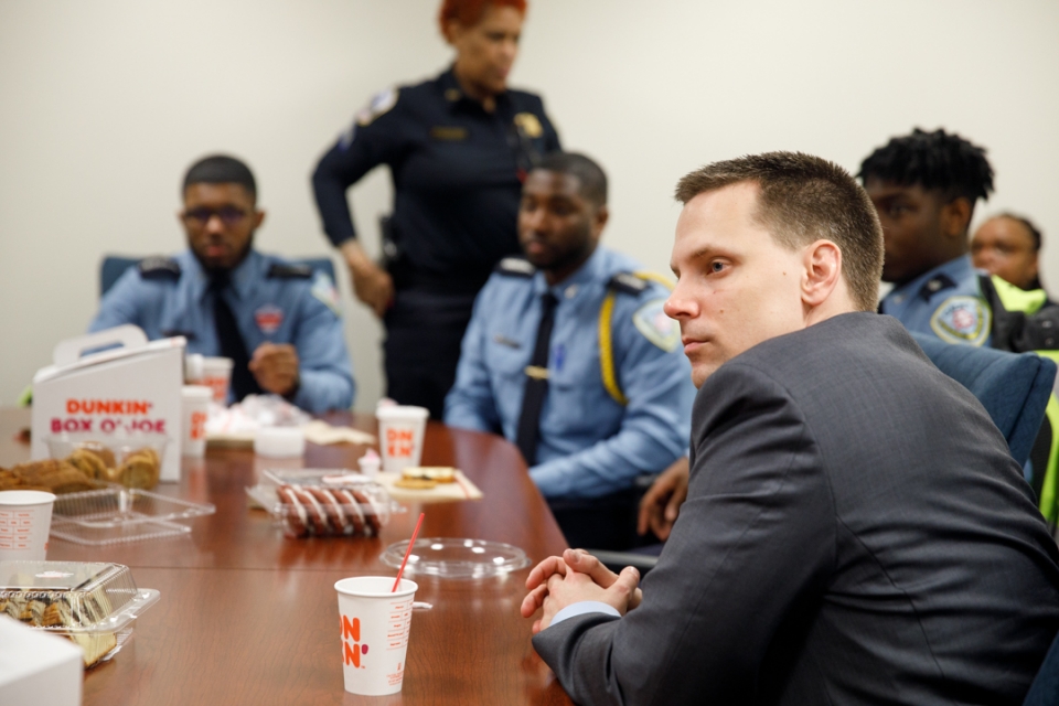 Luke Lorenz GSPM with police officers at event he organized