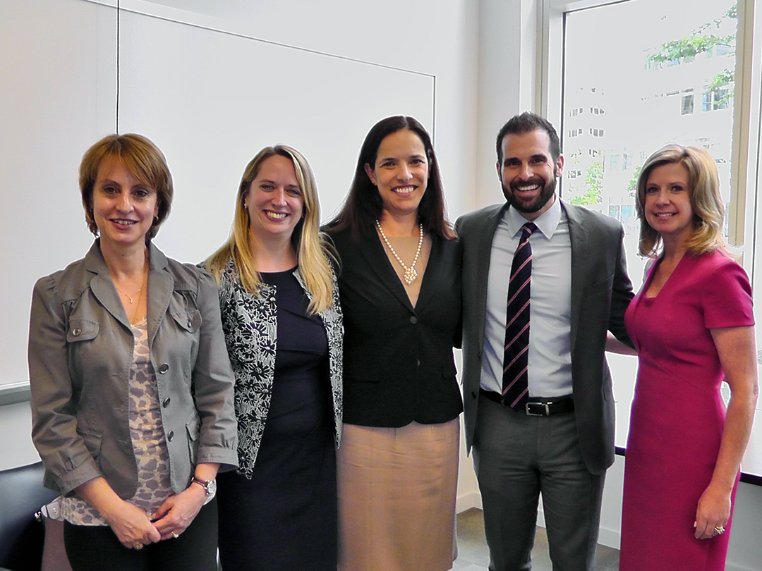 Program Director Lammert with panelists from Guidehouse