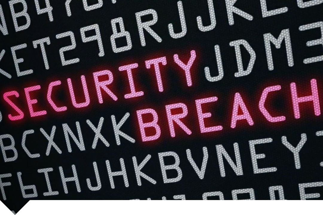 Computer screen with words Security Breach in red