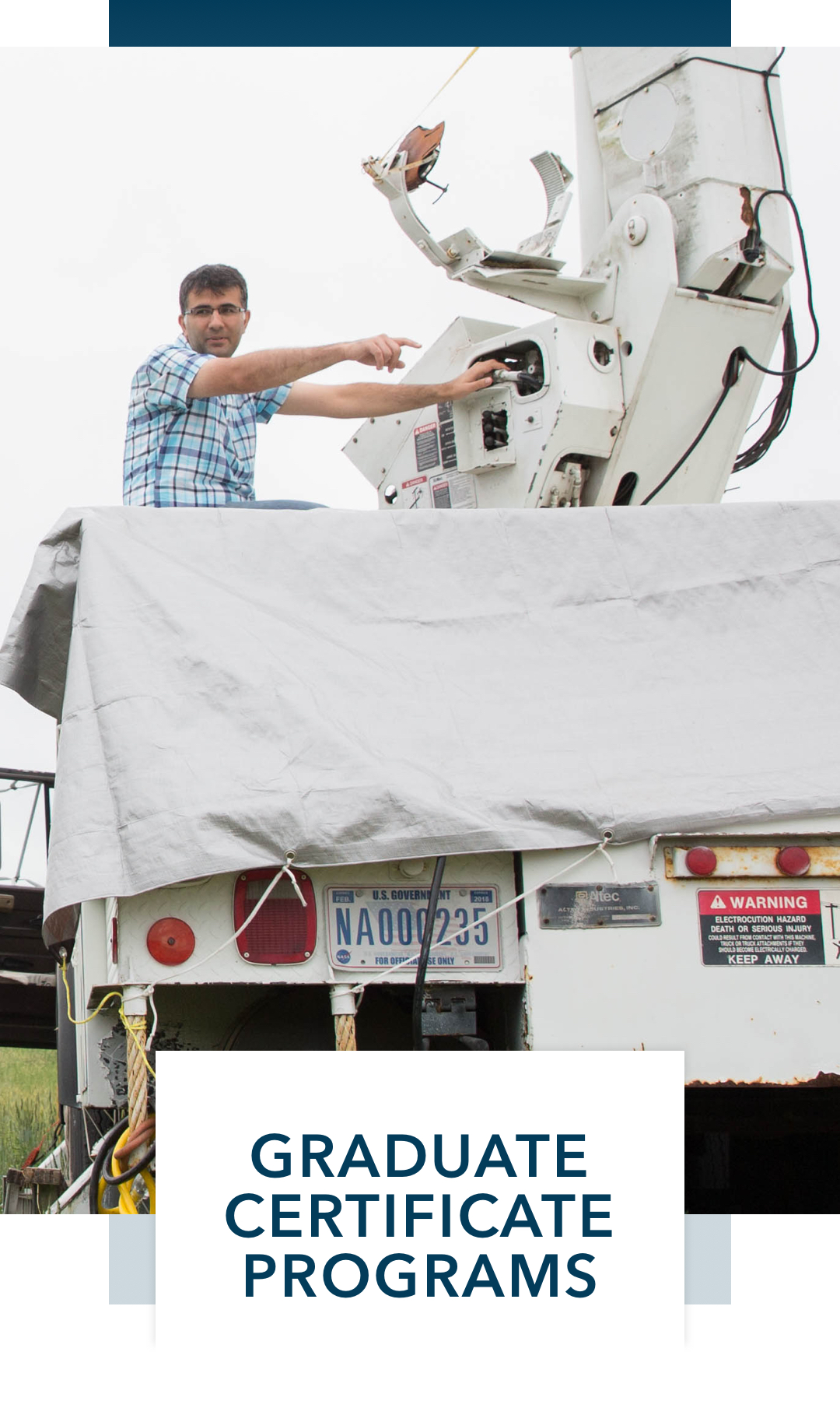 Man working on machine; graduate certificate programs