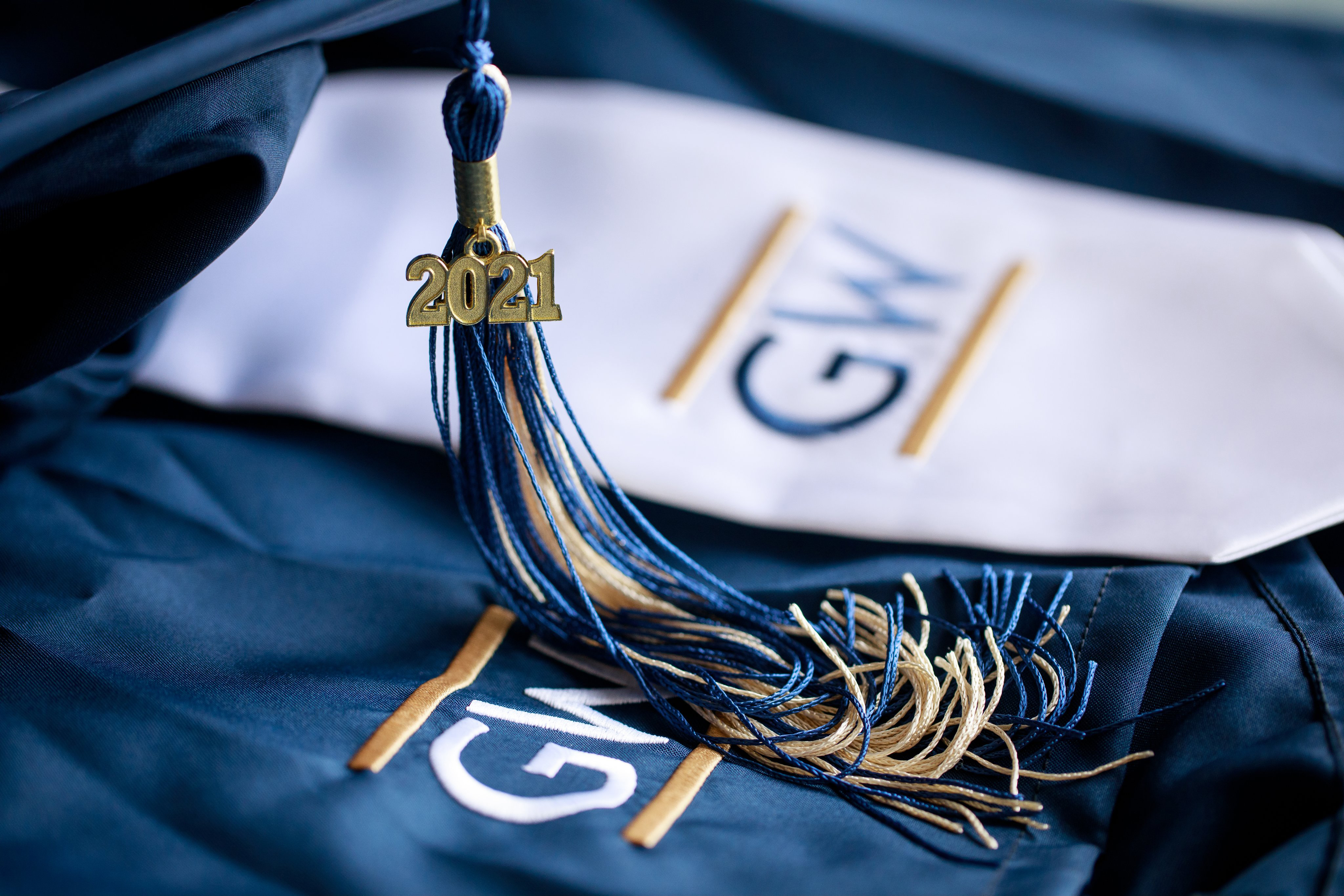 GW logo with embroidered blue, buff material and 2021 tassle