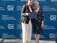 Toni Marsh with student receiving the certificate