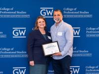 Martin V. receiving award from CPS Dean Riddle