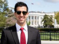 Adam Brown, GSPM '19, pictured in front of the White House