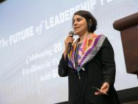 Ina Gjikondi with microphone