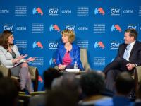 GSPM director Lara Brown talks to 2 panelists at lecture