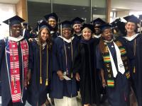 Paralegal student group in cap and gown attire