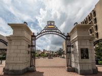 Trustees gate at GW with words GW above the arch
