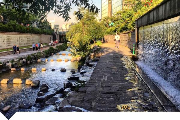 Cityscape with waterfalls and water passage
