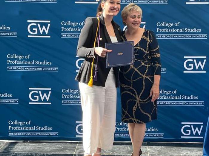 Toni Marsh with student receiving the certificate