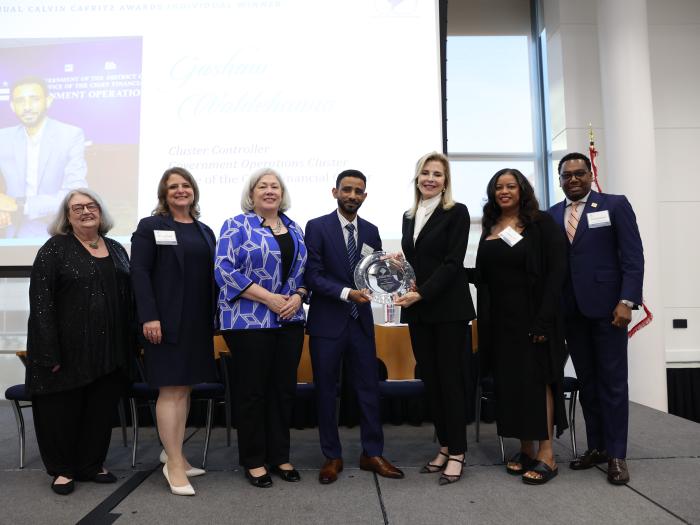 Natalie K. Houghtby-Haddon, Liesl Riddle, Ellen M. Granberg, Gashaw Woldehanna, Jane Cafritz, Angelique Hayes Rice, and Charles Hall Jr. celebrate public service excellence at the 22nd Annual Cafritz Awards Gala.