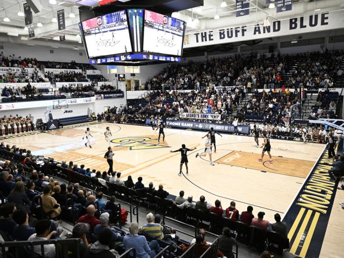 GW basketball game in arena