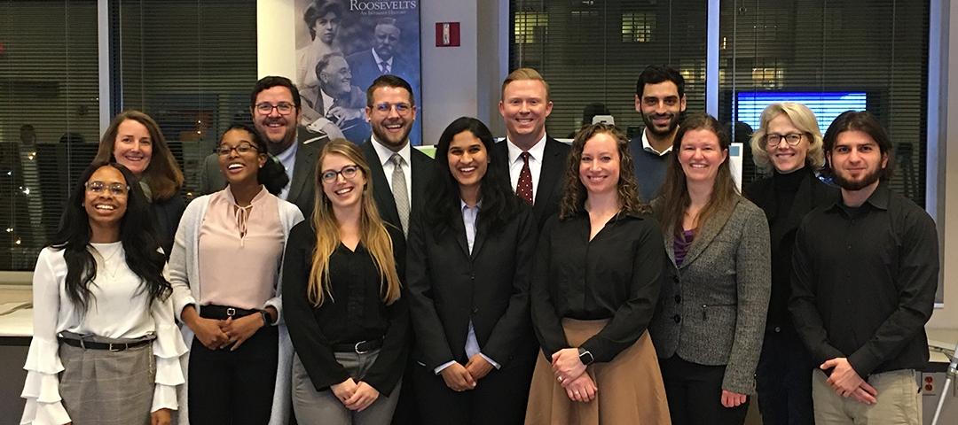 The Fall 2019 studio class poses before the community open house begins. Students gathered input from residents and merchants.