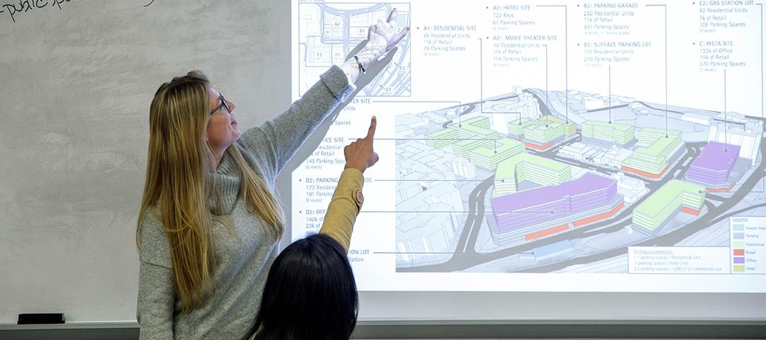 Hannah Morrison explains the proposed density changes to Shirlington residents.