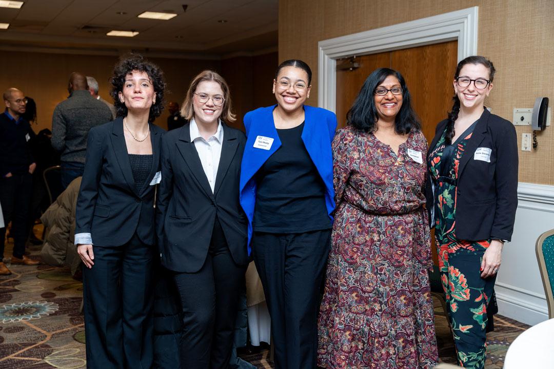 Students and Professional Access Roundtable attendees smile and pose