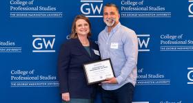 Martin V. receiving award from CPS Dean Riddle